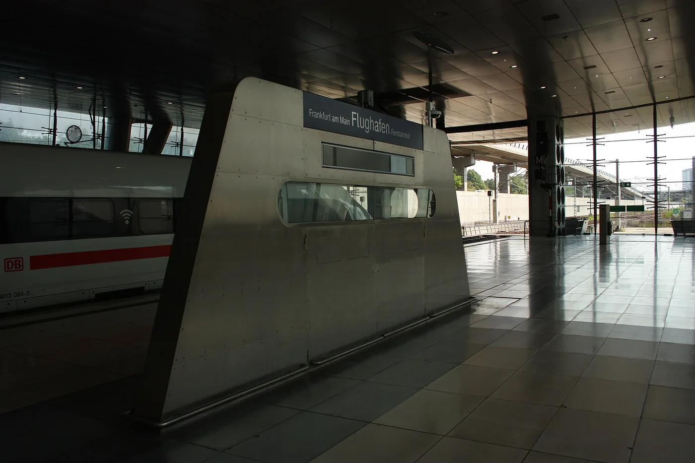 A platform and station signs inside Frankfurt Airport Fernbahnhof